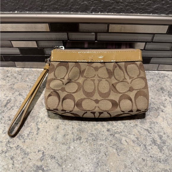 Coach Handbags - Coach Signature Camel/Tan Canvas Wristlet